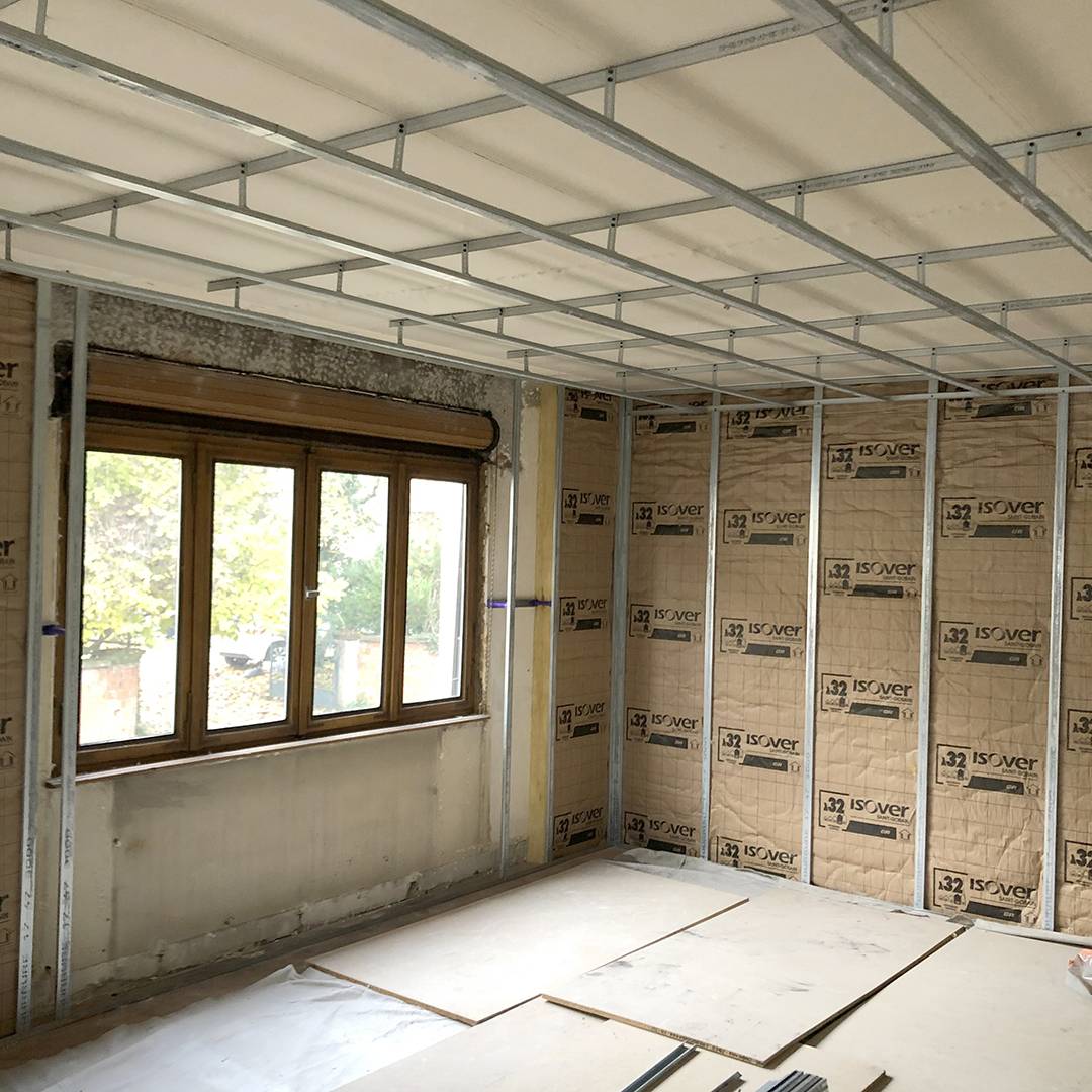 Isoler les murs d'un appartement par l'intérieur à Strasbourg et sa région