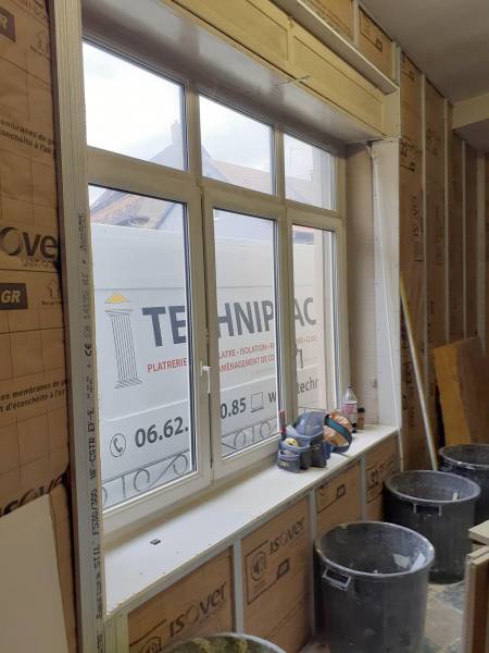 Travaux d'isolation des murs et de plâtrerie dans une maison en rénovation près de Strasbourg